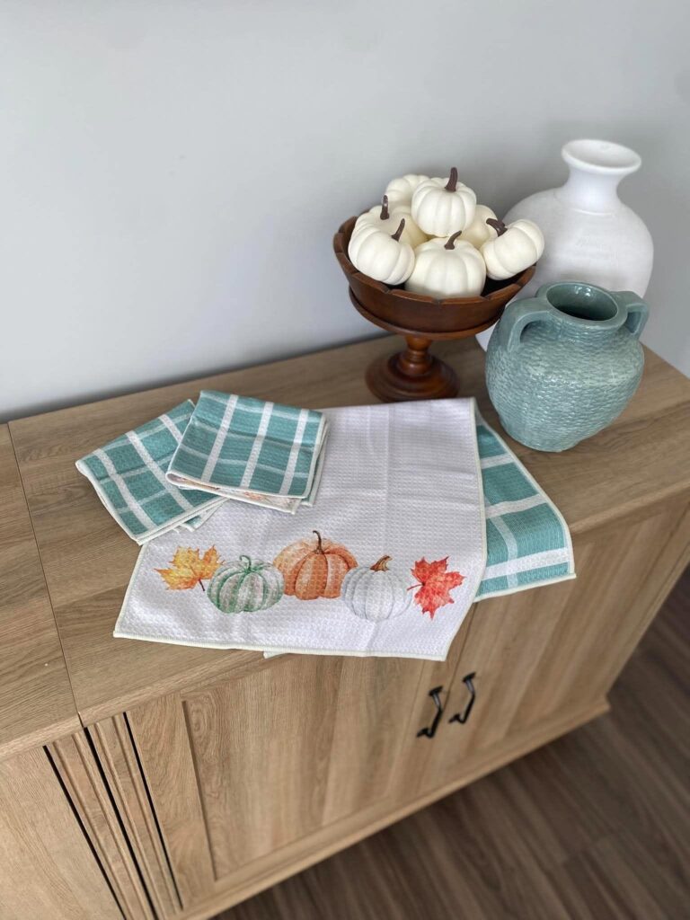 Lifestyle example of Norwex tea towels and napkins styled for a fall gathering