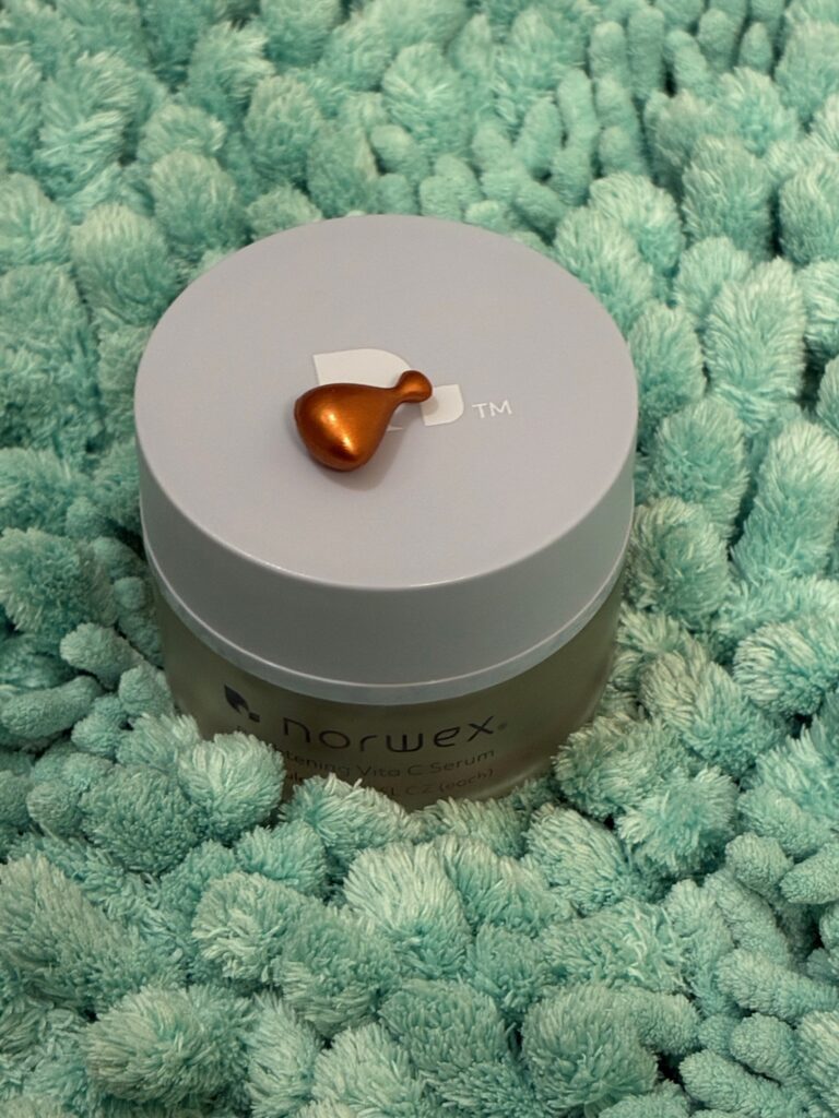 Norwex Brightening Vitamin C Serum with its morning serum capsule.